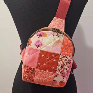 Mav Sling Patchwork Mini Sling Backpack: Ruby Star Society Crossbody Bag